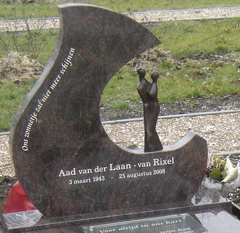 Grafmonument m,et een bronzen beeld van Els Slot